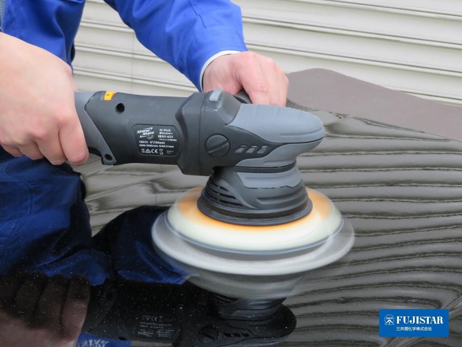 Black wool, ideal for removing paper
        grain, being polished on a cordless double-action polisher.