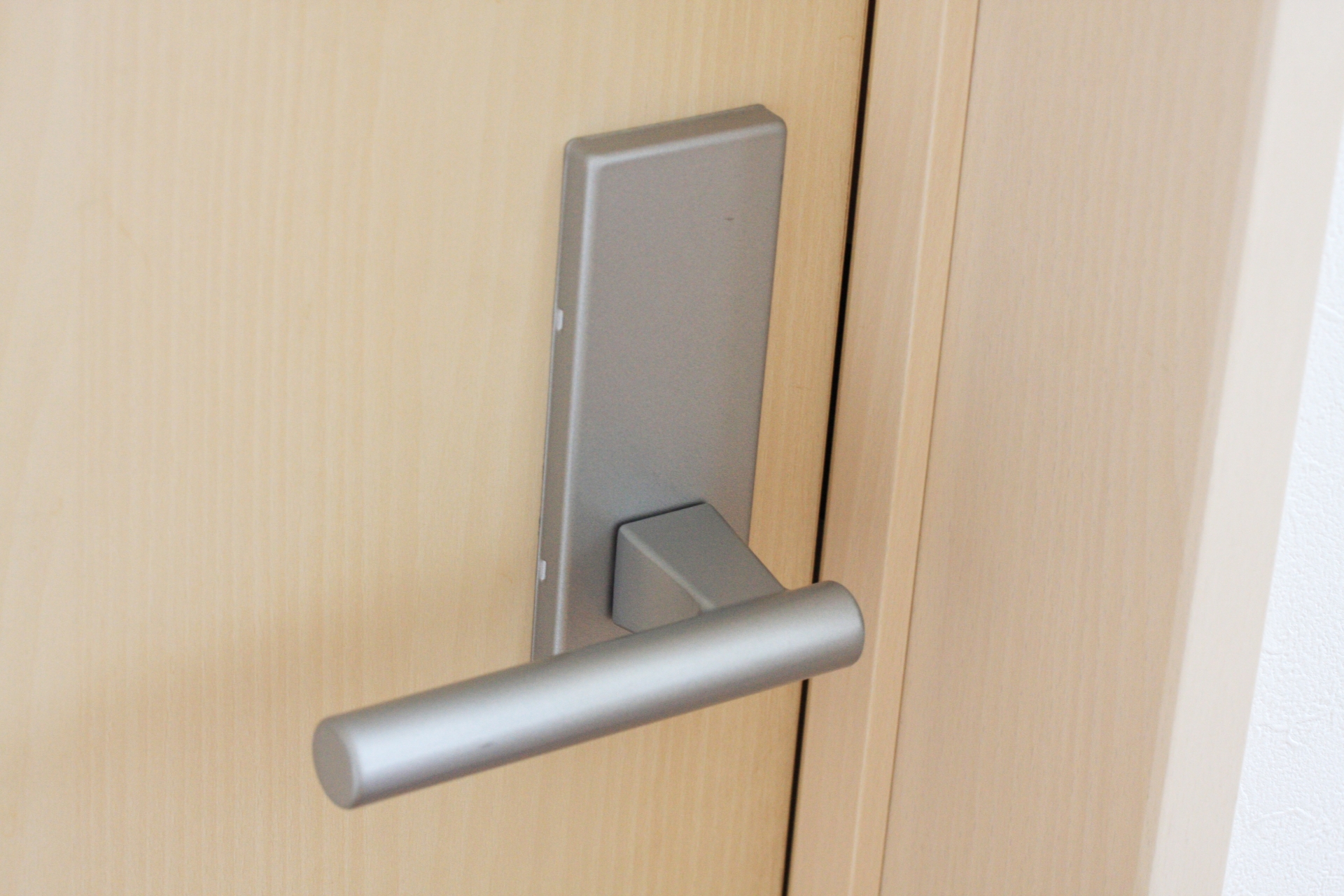 Doorknobs with a pear finish on the metal surface to make fingerprints and stains less noticeable